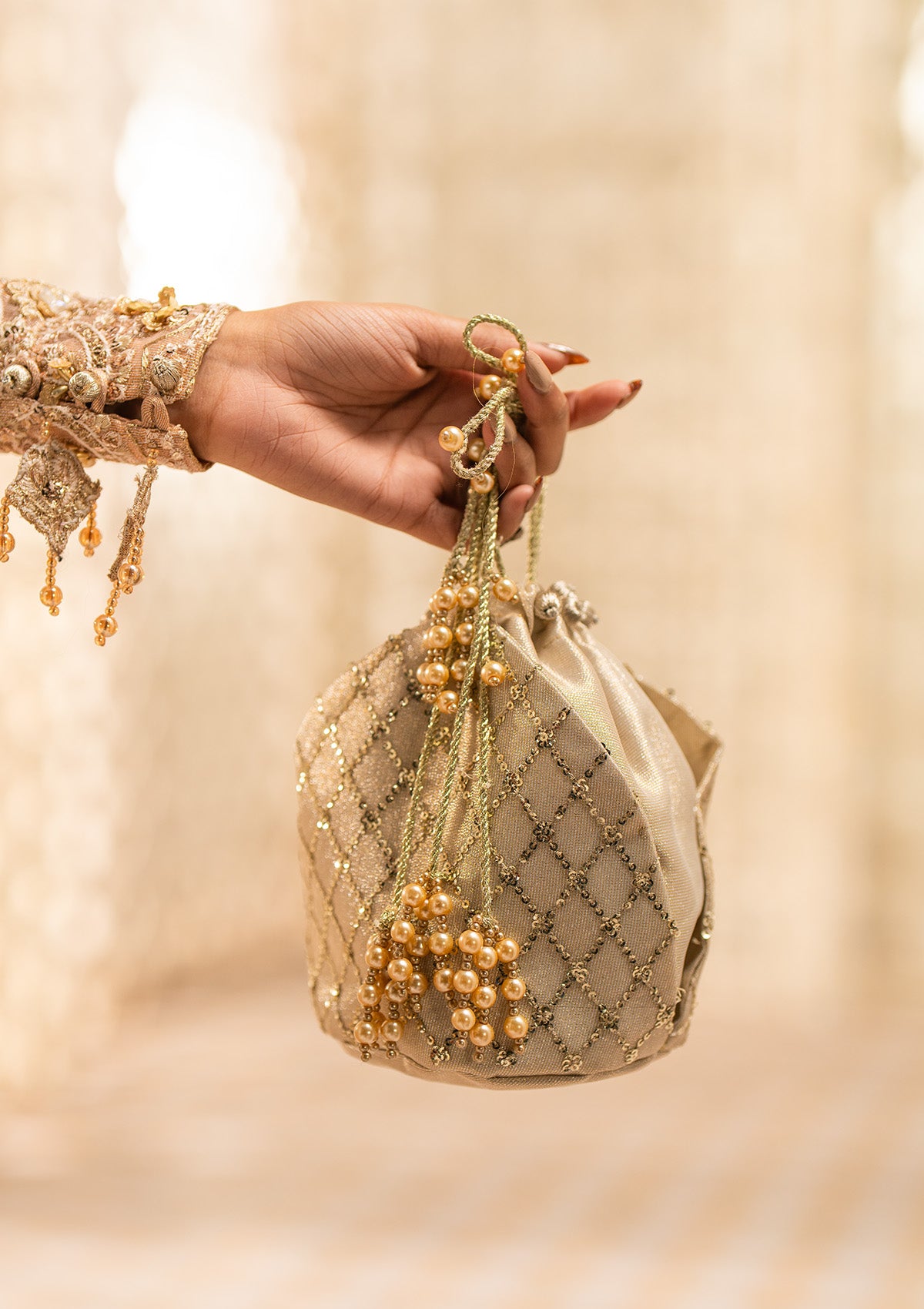 Ayaan Emerald Gold Embroidered Festive Potli